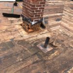 Rebuilt chimney on three-decker roof in Woonsocket, RI
